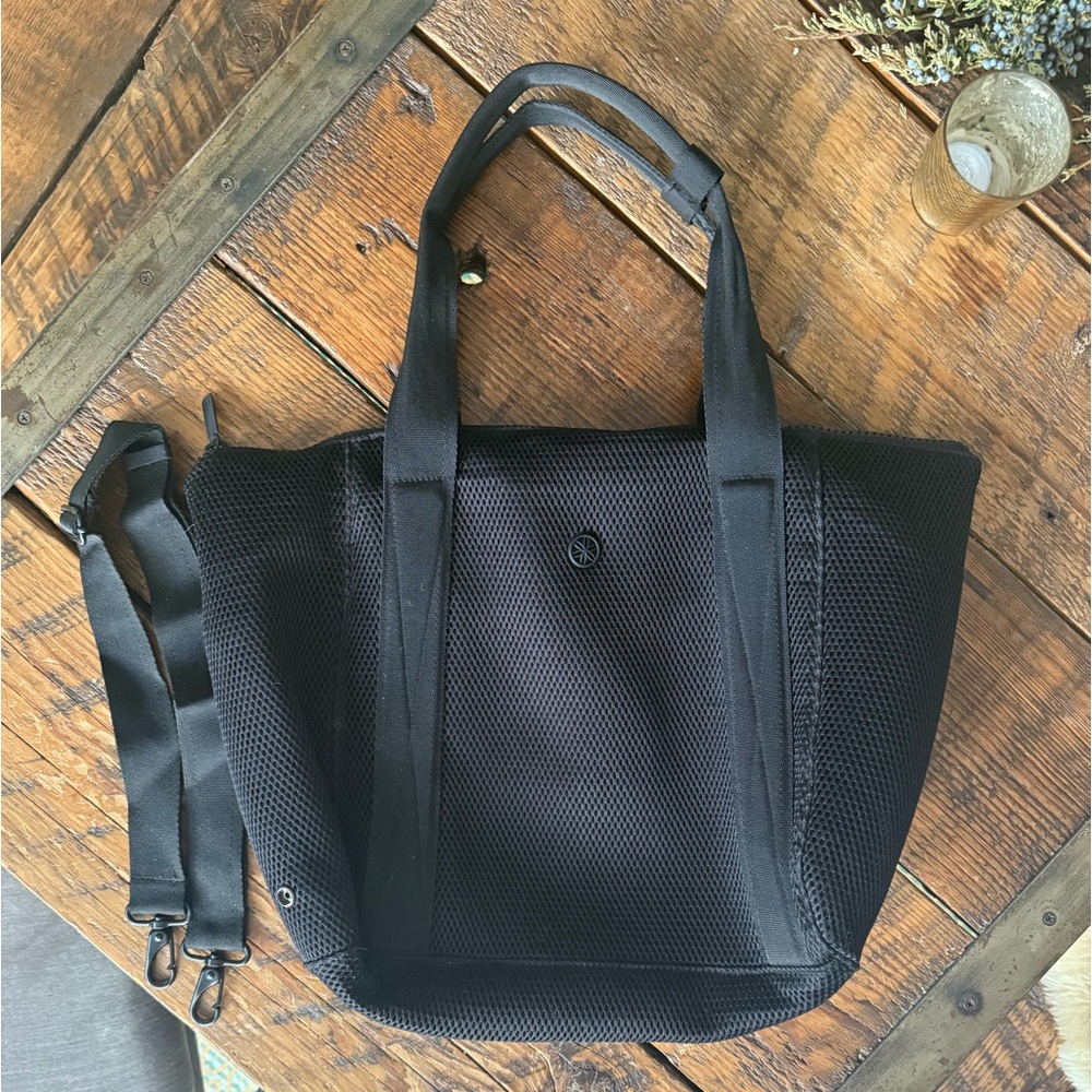 Gaiam Yoga bag. Black Perforated Fabric with attachable shoulder strap.